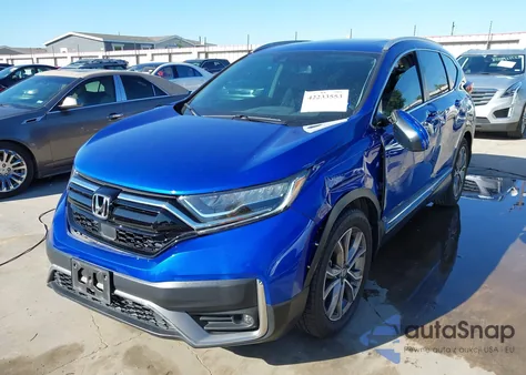 2021 Honda Cr-V 2Wd Touring from USA, damaged, VIN 7FARW1H90ME003796